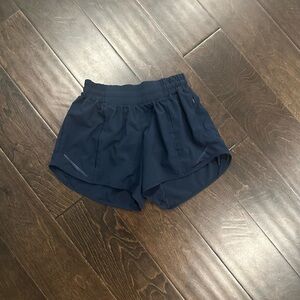 Lululemon Athletica hotty hot low rised 4” navy blue shorts